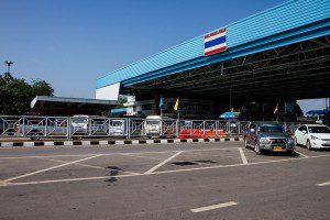 At the Thai Laos border, you exit on the left-hand side.