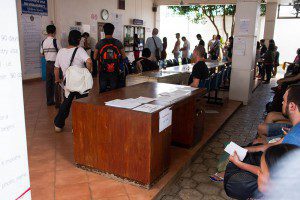 At this table you get your form and submit it when it is filled out.