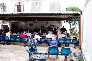 When you come to pickup your Visa wait until the number on your slip is called.