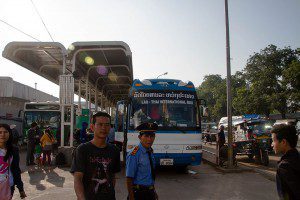 At the bus station go inside and buy the ticket for the bus.